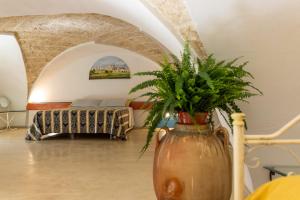 A bed or beds in a room at Corte Del Campanaro