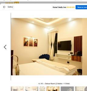Postel nebo postele na pokoji v ubytování Aaraadhy Shree palace, Ayodhya