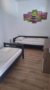 Postel nebo postele na pokoji v ubytování Pension Haus Nova