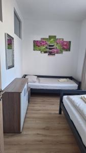 Postel nebo postele na pokoji v ubytování Pension Haus Nova