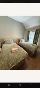 Voodi või voodid majutusasutuse Harding Haven toas