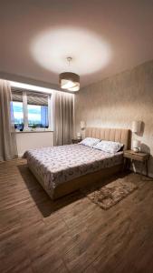 Ένα ή περισσότερα κρεβάτια σε δωμάτιο στο Apartament na Jadwigi