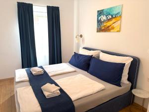 Postel nebo postele na pokoji v ubytování Gästeapartments Rossatz