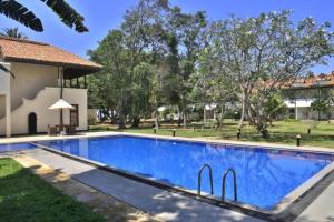 Bazén v ubytování Hibiscus Beach Hotel & Villas nebo v jeho okolí