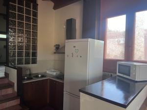 Kuchyň nebo kuchyňský kout v ubytování Casas Rurales el Cerrete de Haro