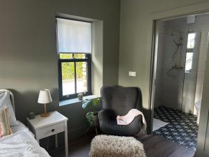 Posezení v ubytování Maggies Cottage + 1 fotografie