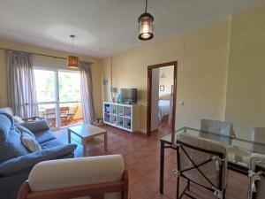 Et tv og/eller underholdning på Apartamento Islantilla Golf