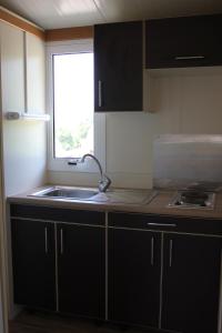 Dapur atau dapur kecil di Les Hauts de Torraccia +2 gambar