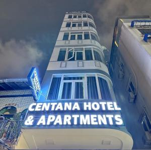 a tall building with a sign that reads centanza hotel and apartments at Centana Hotel & Apartments in Ho Chi Minh City