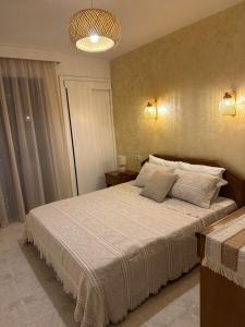 Postel nebo postele na pokoji v ubytování Villa Pietra
