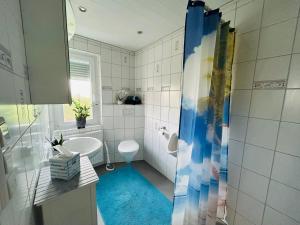 Ένα μπάνιο στο Ferienwohnung Traufgang