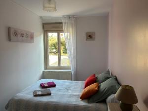 Postel nebo postele na pokoji v ubytování GÎTE Au Bord De L'Iton