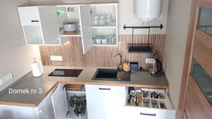 Η κουζίνα ή μικρή κουζίνα στο Bałtyckie apartamenty dom nr 3