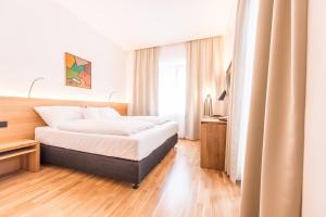 Letto o letti in una camera di Göttfried - essen trinken schlafen
