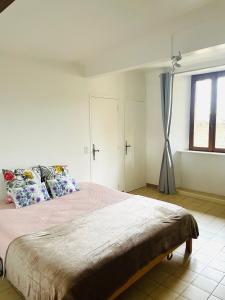 Posteľ alebo postele v izbe v ubytovaní Maison LINA
