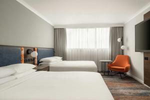 Postel nebo postele na pokoji v ubytování Glasgow Marriott Hotel