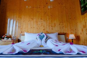 Postel nebo postele na pokoji v ubytování Bungalow Ven Sông