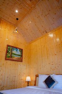Postel nebo postele na pokoji v ubytování Bungalow Ven Sông
