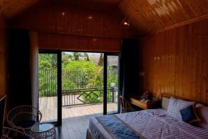 Postel nebo postele na pokoji v ubytování Bungalow Ven Sông