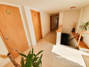 Posedenie v ubytovaní Ferienhaus am Waldrand mit Schwimmbad und Sauna
