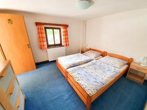 Posteľ alebo postele v izbe v ubytovaní Ferienhaus am Waldrand mit Schwimmbad und Sauna