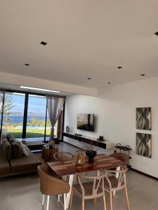 a living room with a table and a couch at Dzixile in Gueima