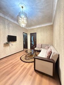 TV a/nebo společenská místnost v ubytování KM Hostel and Tourism