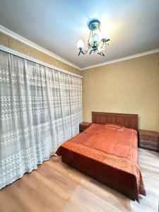 Postel nebo postele na pokoji v ubytování KM Hostel and Tourism