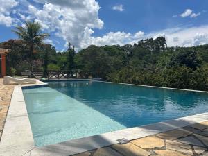 Bazén v ubytování Matiz Igaratá Resort, Spa e Eventos nebo v jeho okolí