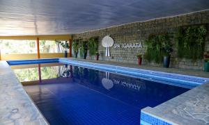 Bazén v ubytování Matiz Igaratá Resort, Spa e Eventos nebo v jeho okolí