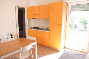A kitchen or kitchenette at Case al mare in Salento - bilocale B9