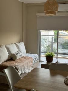 Regia Apartamentos Posadas客房内的一张或多张床位