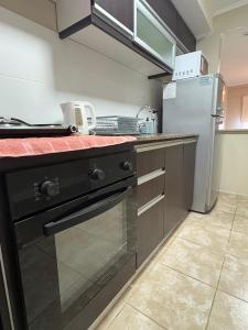 Regia Apartamentos Posadas的厨房或小厨房