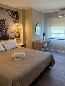 Postel nebo postele na pokoji v ubytování Regia Apartamentos Posadas