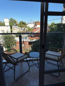 Regia Apartamentos Posadas的阳台或露台