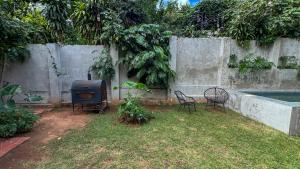 Bazén v ubytování Casa colonial familiar con jardín y piscina en el centro de Asunción - Ideal para grupos nebo v jeho okolí