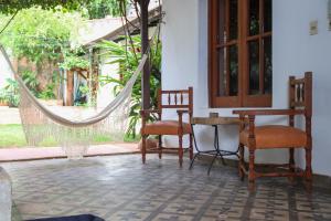 Posezení v ubytování Casa colonial familiar con jardín y piscina en el centro de Asunción - Ideal para grupos