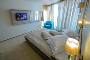 Postel nebo postele na pokoji v ubytování Hotel Turquoise All Inclusive + 15 fotografií