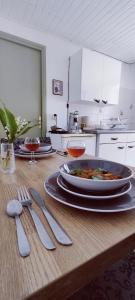 a table with a plate of food on top of it at Studio montagne in Aulus-les-Bains +22 photos