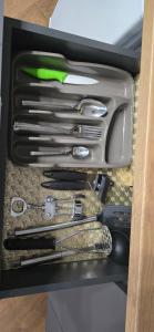 a drawer with a bunch of knives and other utensils at ЖК Яровиця Люкс 2 поверх in Luts'k