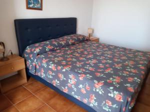 Postel nebo postele na pokoji v ubytování B&B Villa Le Palme Scalea