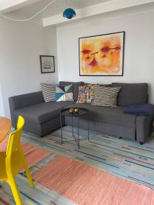 Posezení v ubytování Tinyhouse Thorøhuse