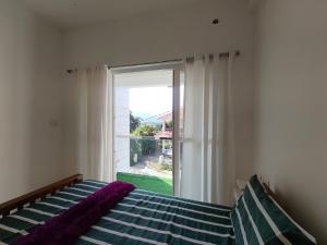 Ένα ή περισσότερα κρεβάτια σε δωμάτιο στο Hills villa