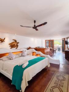 Ένα ή περισσότερα κρεβάτια σε δωμάτιο στο Punta Arena Surf Suites