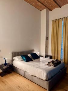 Postel nebo postele na pokoji v ubytování Muradelle B&B
