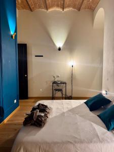 Postel nebo postele na pokoji v ubytování Muradelle B&B