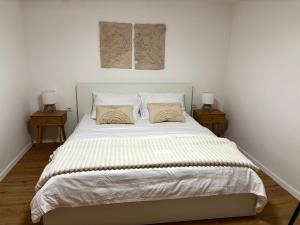 Ένα ή περισσότερα κρεβάτια σε δωμάτιο στο OliveTree Apartments