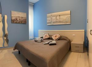 Postel nebo postele na pokoji v ubytování RESIDENCE EL PALMAR FRONTE MARE, FRONTE SPIAGGIA (5 metri), FRONTE PISCINA (4 metri)