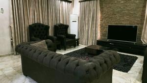 TV in/ali zabaviščno središče v nastanitvi Plot 438
