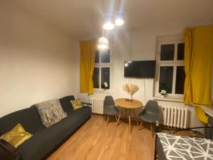 Posezení v ubytování Magnolia Rooms Plus